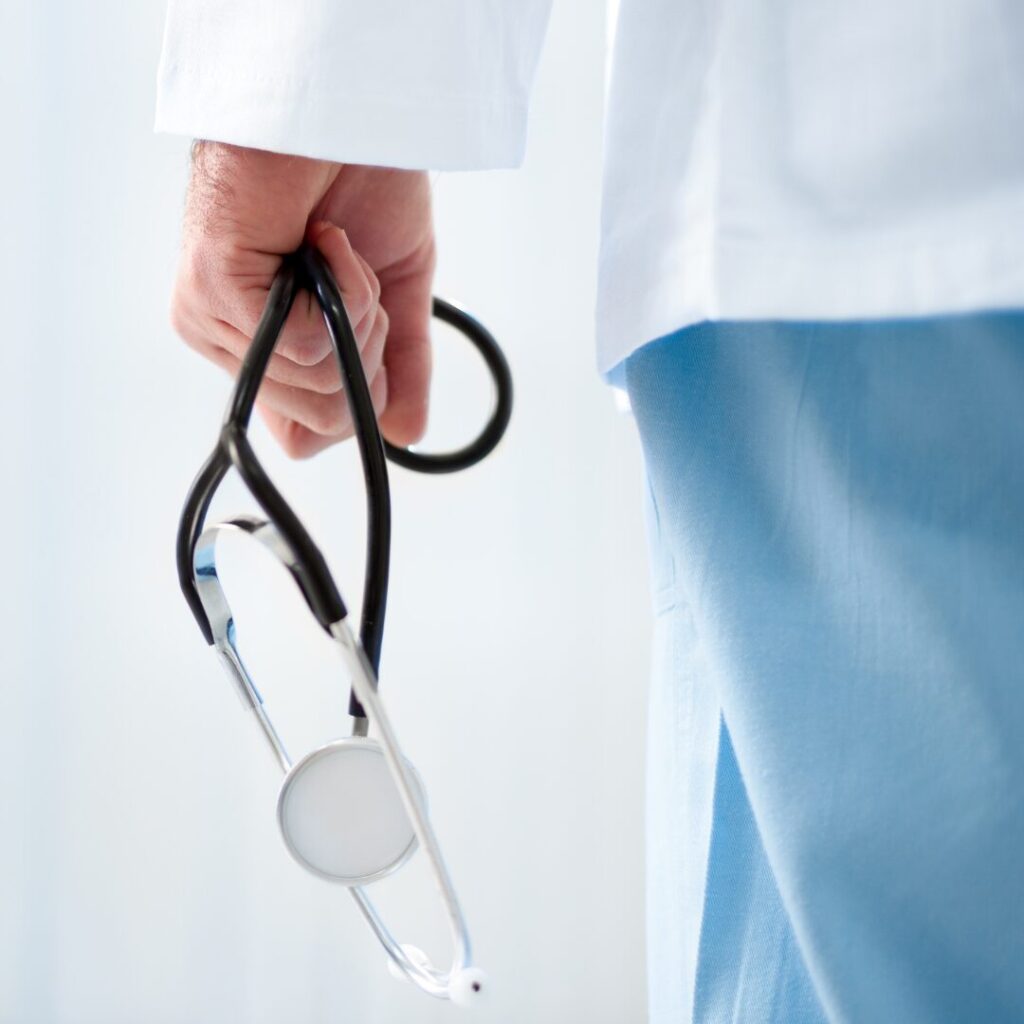 A doctor holding a stethoscope